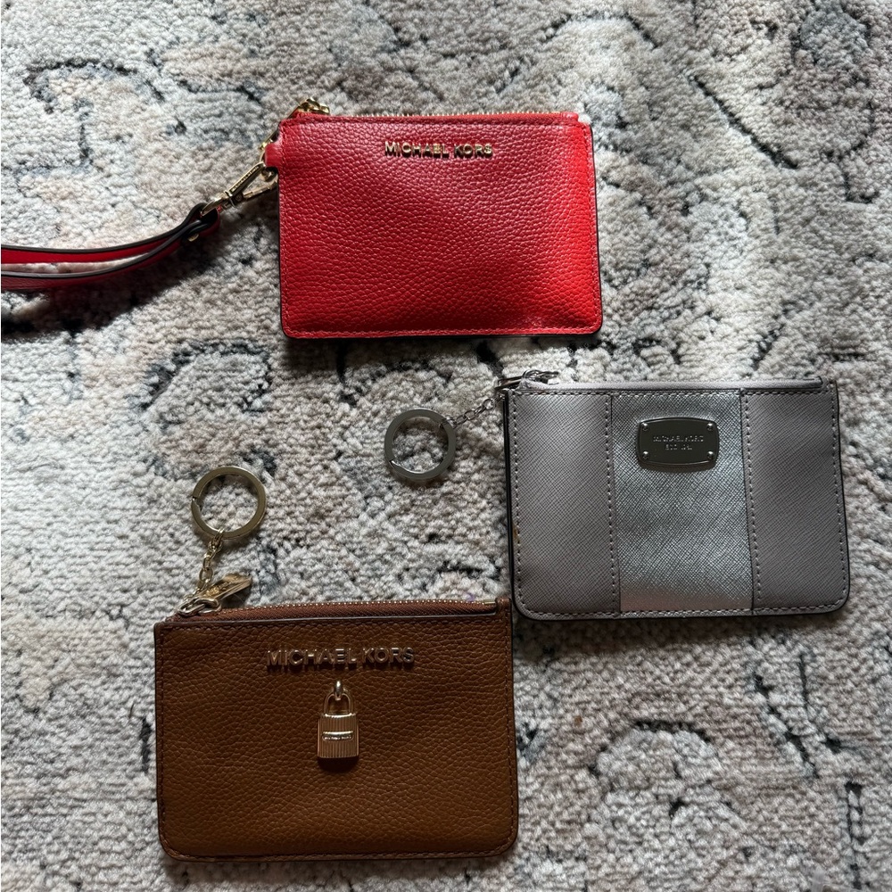 Michael Kors Wristlet Trio - Red, Brown, Gray
